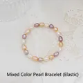 Mixed-color baroque pearl bracelet with elastic cord featuring white and pink pearls - Multicolor Pearl Bracelet (Elastic)