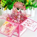 3D pink Christmas pop-up card featuring a cozy snow house and snowman winter scene - Pink Christmas