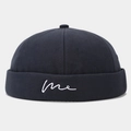 Detail of white cursive me embroidery on navy blue cotton dock worker cap brim - Adjustable / Dark Gray