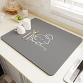 Absorbent kitchen mat in dark grey with a cartoon chef dog and Cooking text - Puppy Chef