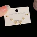 Three-piece gold earring set with bow, clover, and leaf designs on S925 silver needles - Gold-Ginkgo Leaf Set (81#)
