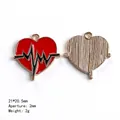 Heart-shaped gold medical pendant with red enamel finish and black heartbeat line detail - Heartbeat ECG