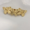 Elegant triple butterfly spring hair clip in gold finish with textured metal wings - Gold Triple Butterfly Barrette
