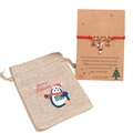 Detail of Christmas candy cane charm on red woven rope bracelet with gift card and pouch - Candy Cane Bracelet + Penguin Gift Bag