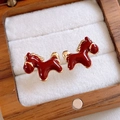 Close-up of red enamel horse earrings with gold plating in a luxury wooden jewelry box - 1# Silver Earring Post - Enamel Horse Pendant Studs (Gold Plated)