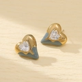 Makro-Detail von Herzohrringen mit grauer Emaille und Zirkon in 18K Goldbeschichtung - Grau