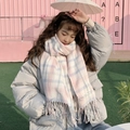 Pink and blue plaid checkered scarf with fringe worn by a model in outdoor setting - Japanese Plaid