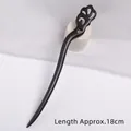 Handcrafted 18cm black sandalwood hair pin featuring traditional carved Ruyi cloud patterns - Cai Chun