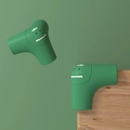 Protezione angolare in silicone verde mostro per sicurezza bambini su mobili in legno - Angolo Dinosauro Corto Verde