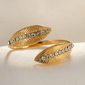 Macro detail of gold adjustable feather ring with pavé cubic zirconia on silk background - Adjustable Open / 18K Gold Plated Leaf White Zircon