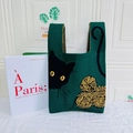 Dark green knitted tote bag with black cat pattern and yellow yarn ball design - Dark Green Spying Cat