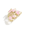Elegant golden leaf hair claw clip with pink enamel details and spring-driven metal teeth - Leaf Design / Pink