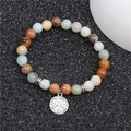 Bracciale di perle in occhio di tigre e agata con un ciondolo a loto in argento vintage - Amazonite + Loto