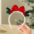 Christmas hairband with red sequin bow and green reindeer antlers for holiday parties - Antler Bow
