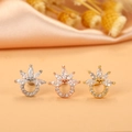 Macro shot of zircon-inlaid flower and crown stud earrings in silver, gold, and rose gold - 6# Crown Flower