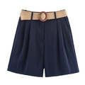 Detailed close-up of dark blue casual high-waisted shorts with a woven belt and wooden buckle - Aquamarine