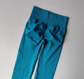 Peacock blue high-waisted yoga pants with scrunch butt lifting and seamless texture - Teal