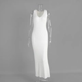 Detail view of white ribbed knit maxi dress showing deep V-neckline and slim fit texture - S / Off White