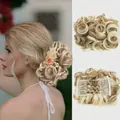 Detail of light blonde curly hair bun extension with comb clip attachment - 18H613 (Platinum Blonde Highlights)