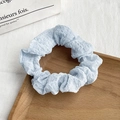 Floral scrunchie in light blue seersucker fabric with ruffled texture on wooden tray - 17# Light Blue Seersucker