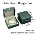 Dark green PU leather bracelet jewelry box with golden crown buckle and cream velvet lining - Bracelet Box / Dark Green