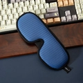 Close-up of breathable 3D sleep mask with blue honeycomb mesh and soft black piping - Single Item / Blue