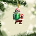 Detailed view of Santa Claus acrylic ornament hanging on a lush green Christmas tree branch - Holding Green Gift Box Style (8)