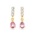 Macro detail of drop earrings with pink pear-cut gemstones and sparkling white zircons - Pink Gold