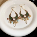 Detail of bohemian crescent earrings with colorful beads and sequins on white porcelain - Gold with Green (Ear Hook)