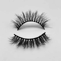 Close-up of thick, curled black faux mink eyelashes with soft synthetic textures - D287