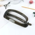 Translucent amber oval hair claw clip in matte resin finish for half-up hairstyles - Dark Gray