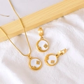 Parure collier et boucles d'oreilles dorés avec émail blanc et motif étoile solaire - Ensemble Zirconium Blanc