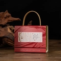 Close-up of red Chinese wedding candy box with leather handle on wooden background - Small (with Leather Handle) / T019-2 Classic Red (Poetry)