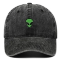 Close-up detail of green alien head embroidery on washed black cotton denim baseball cap - Black