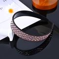 Sparkling black rhinestone headband with multi-color crystals on reflective surface - Big Purple Rhinestone