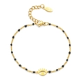 Detail of gold stainless steel bracelet with black beads and evil eye charm and clasp - Black