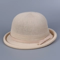 Close-up of the beige knit bowler hat featuring a delicate bow tie and woven texture - M (56-58cm) / Beige