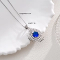 Collana d'argento con ciondolo a goccia in pietra blu e zirconi su vassoio bianco - Blu Reale