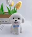 Cute white bichon dog night light with blue plaid bow tie on decorative book props - Blue Bow Dog