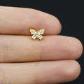 Detailed close-up of a gold butterfly nose stud with shimmering clear zircon stones - Agile Butterfly Style (24082011059)
