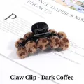 Close-up of plush leopard print faux fur pom poms on a dark coffee brown hair banana clip - Dark Coffee Leopard Claw Clip
