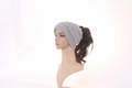 Light grey cable knit ponytail beanie for winter outdoor warmth and comfort - One Size / Light Gray
