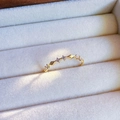 Elegant gold bow ring with sparkling gemstones on white plush display - J5028-Gold Wave Rhinestone
