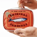 Detail of sardine can makeup bag with orange embroidery and a functional metal zipper - Orange