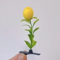 Funny sprout hair clip with bright yellow fruit and green leaves on a metal duckbill clip - Lemon Tree