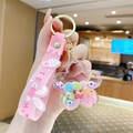 Pink keychain with ICE CREAM silicone strap and flower pendant with colorful glitter - Quicksand Shell - Sakura
