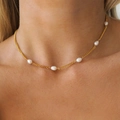Elegant 18k gold plated stainless steel necklace with white freshwater pearls on model - Pearl Necklace