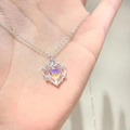 Double-layered butterfly necklace featuring a heart pendant with iridescent purple gem - Gradient Heart Gem Necklace
