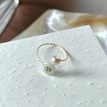 Golden twisted ring variant with pearl and light green stone featuring flower detail - Pearl Green Jade Twist (J3776)