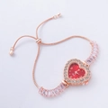 Detail of rose gold ladies' watch with red heart dial and adjustable stone-set bracelet - Rose Gold-Heart Red Dial
